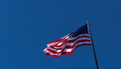 The American flag waving in the wind