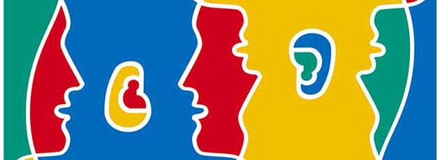 Logo for Språkdagen med profil av to hoder vendt mot hverandre i grønt, rødt, gult og blått