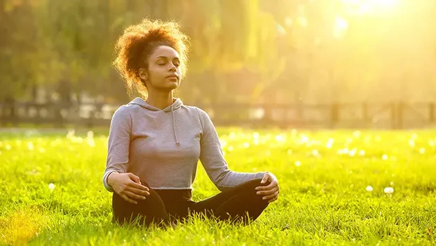 woman-meditating-outside